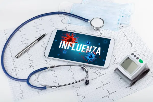 Influenza碑文と白い表面上のタブレットPcと医師のツール パンデミックの概念 — ストック写真
