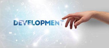 DEVELOPMENT yazıtlarına el işareti, modern teknoloji kavramı