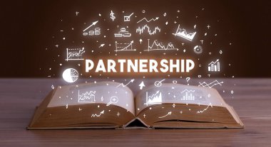 Açık bir kitaptan çıkan ortaklık kitabesi, iş kavramı