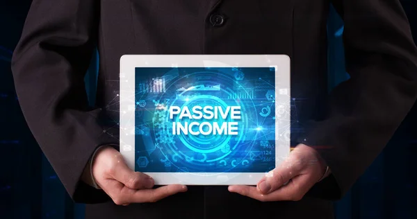 Young Business Person Working Tablet Shows Inscription Passive Income Business — Stock Photo, Image