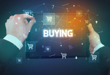 Yazı, online alışveriş konsepti satın alan bir tabletin yakın çekimi