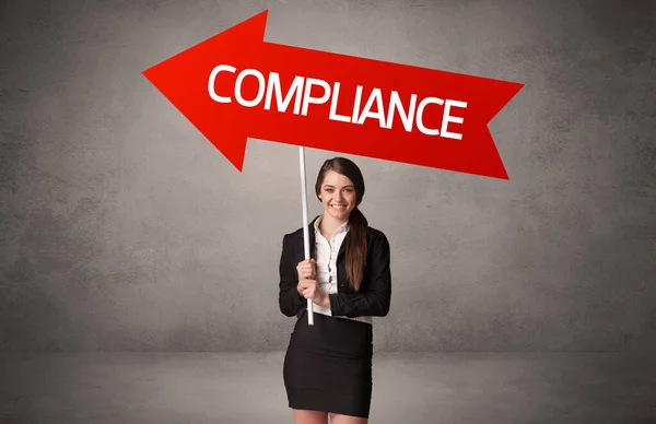 Young Business Person Casual Holding Road Sign Compliance Inscription Business — Stock Photo, Image