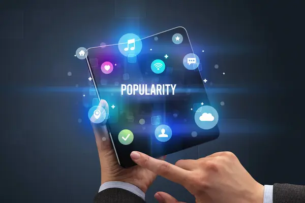 Businessman Holding Foldable Smartphone Popularity Inscription Social Media Concept — Stock Photo, Image
