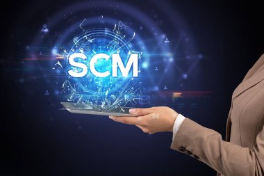 SCM kısaltmalı bir dokunmatik ekran, modern teknoloji konsepti