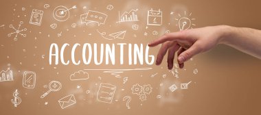 Kesilmiş ellerin yakın çekimi Muhasebe yazısına işaret ediyor, modern iş çözümü kavramı