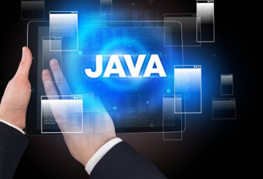 JAVA kısaltması, modern teknoloji konsepti ile el ele tutuşan tabletin yakın çekimi