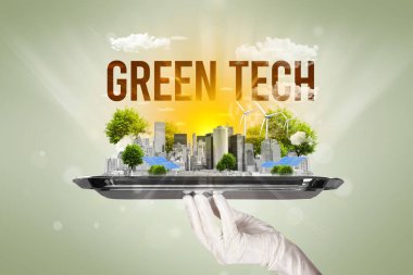 GREEN TECH yazıtları ve yenilenen enerji konseptiyle Eko Şehri 'ne hizmet eden garson