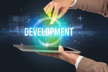 DEVELOPMENT yazıtlı bir dokunmatik ekran, yeni teknoloji konsepti