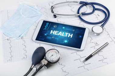 HEALTH yazıtlı tablet bilgisayar ve tıbbi malzemeler, önleme kavramı