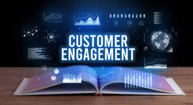 Açık bir kitaptan çıkan Müşteri Katılımı yazıt, yaratıcı iş konsepti