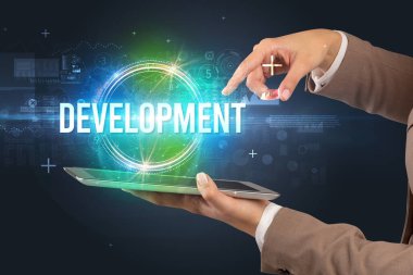 DEVELOPMENT yazıtlı bir dokunmatik ekran, yeni teknoloji konsepti