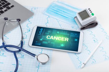 CANCER yazıtlı tablet bilgisayar ve tıbbi malzeme, önleme kavramı