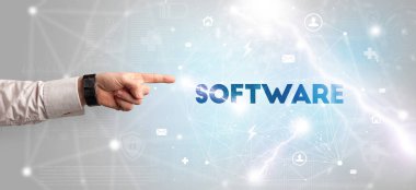 SOFTWARE yazıtlarına el işareti, modern teknoloji kavramı