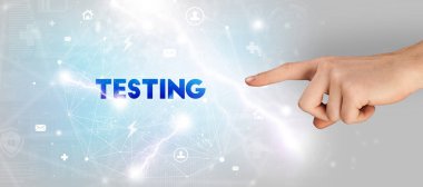 TESTING yazıtlarına el işareti, modern teknoloji kavramı