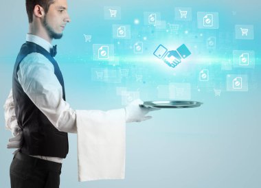 Genç garson tepside tokalaşma ikonları sunuyor, yeni iş modeli konsepti