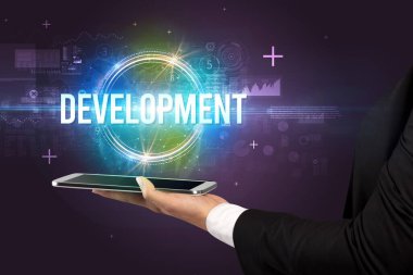 DEVELOPMENT yazıtlı bir dokunmatik ekran, yeni teknoloji konsepti