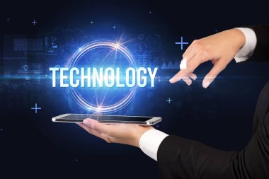 TECHNOLOGY yazıtlı bir dokunmatik ekran, yeni teknoloji konsepti