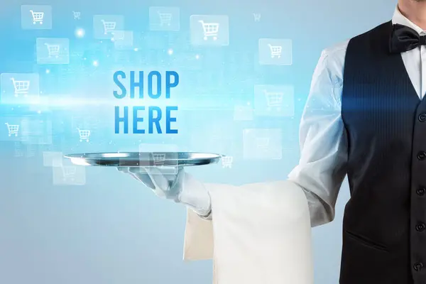 stock image Waiter serving SHOP HERE inscription, online shopping concept