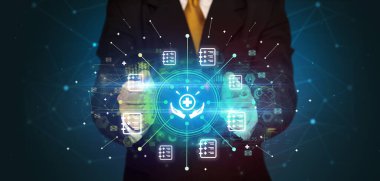 Güçlü bir sağlık ikonu, sağlık hizmeti konseptini tutan zarif bir el.