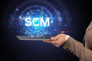 SCM kısaltmalı bir dokunmatik ekran, modern teknoloji konsepti