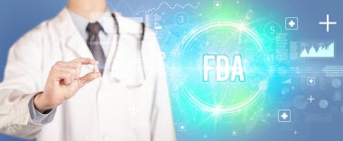 FDA kısaltması, virüs bilimi konsepti olan bir doktor sana ilaç veriyor.