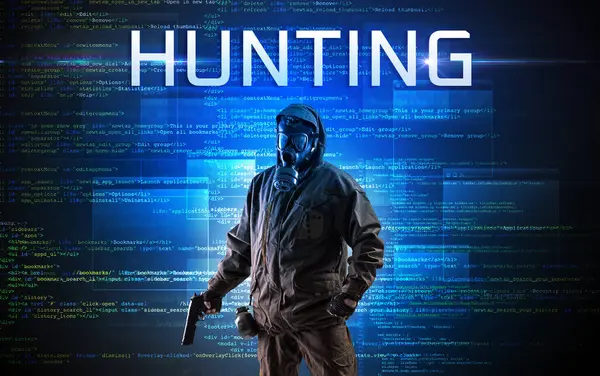 İkili kod arka planında HUNTING yazısına sahip yüzsüz hacker