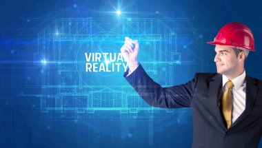 Kasklı yakışıklı mimar VIRTUAL Gerçekçilik yazıtları, yeni teknoloji konsepti