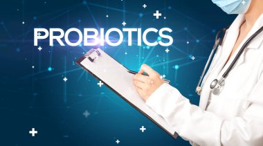 Doktor tıbbî kayıtları PROBIOTICS yazıtları ve tıbbi konseptle dolduruyor.