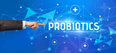 ProBIOTICS yazıtına, tıbbi konsepte yakın çekim el işareti