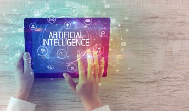 ARTIFICIAL INTELLIGENCE yazıtlı, yenilikçi teknoloji kavramına sahip bir tabletin yakın çekimi