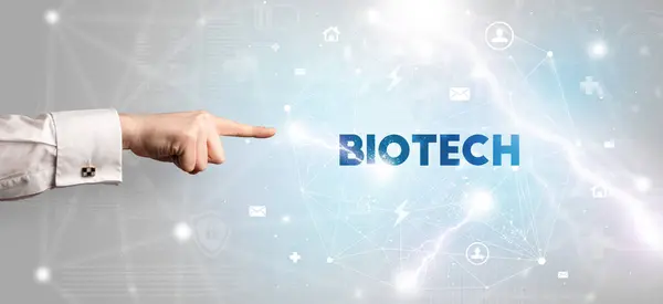 Mano Señalando Inscripción Biotech Concepto Tecnología Moderna Fotos de stock libres de derechos
