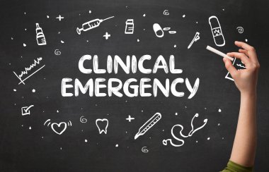 El çizimi CLINICAL EMERGENCY yazı tahtada beyaz tebeşir, tıbbi konsept konsepti konsepti