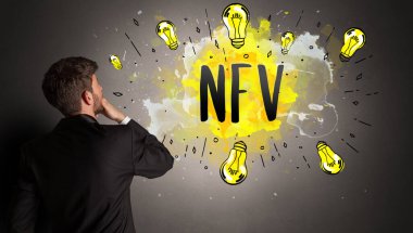 businessman drawing colorful light bulb with NFV abbreviation, new technology idea concept