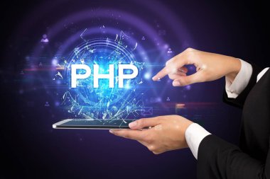 PHP kısaltması olan bir dokunmatik ekrana yakın çekim, modern teknoloji kavramı