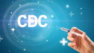 Şırınga iğnesi ile virüs aşısı ve CDC kısaltması, panzehir konsepti