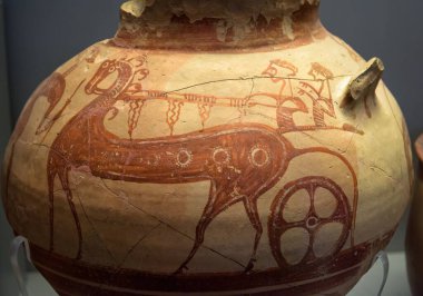 Vase from excavations in Greece, painted archaeological pottery. Ancient Greek jug, pot, terracotta ceramic with ornament. Old Greek patterned crockery close-up. Artifact, culture and Mycenae theme.