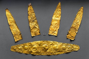 Jewel from Mycenae (Mykines) in National Archaeological Museum, Athens, Greece. Ancient Greek gold jewelry, patterned crown. Theme of history, artifact, wealth, archeology, treasure. May 7, 2018