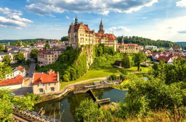Sigmaringen skyline, Baden-Wurttemberg, Germany, Europe. View of Hohenzollern castle by Danube river, landmark of Schwarzwald. Landscape with Gothic mansion in Swabian Alps, city panorama in summer.