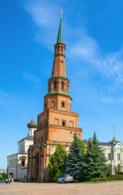 Leaning Suyumbike Tower in Kazan Kremlin, Tatarstan, Russia. It is tourist attraction of Kazan. Vertical view of old landmark in Kazan city center in summer. Concept of sightseeing and travel in Kazan