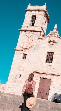 Woman walking in Peniscola city