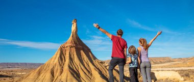 Family enjoying Bardenas desert in Spain