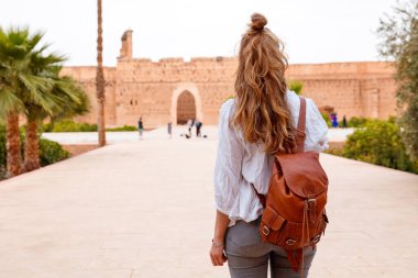 Woman tourist in Marrakech,  el badi palace