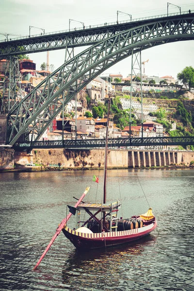 stock image Porto city with traditional gondola boat and famous iron bridge- summer travel destination,  vacation, tourism in Portugal