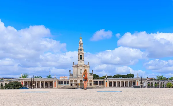 stock image Woman tourist in Fatima city landscape- Famous Basilica pilgrim,  Portugal