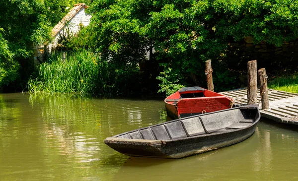 stock image traditional boat on the river and forest- Marais Poitevin in France