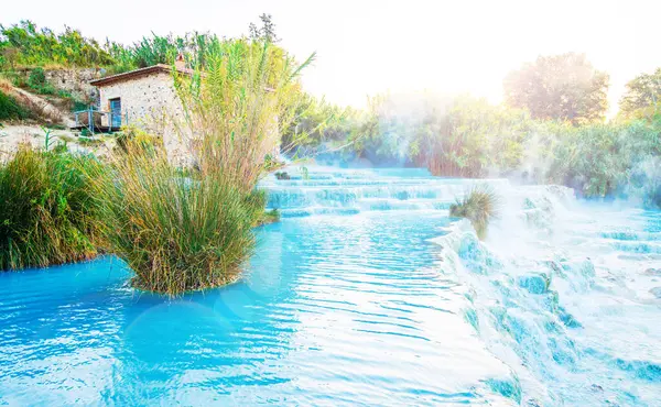 Saturnia natural spa with waterfalls- Hot spring, thermal baths, Grosseto- Tuscany in Italy