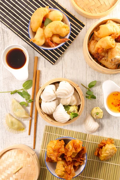 Assorted Asian Food Dumpling Fried Shrimp Spring Roll Spicey Sauce — Stock Photo, Image