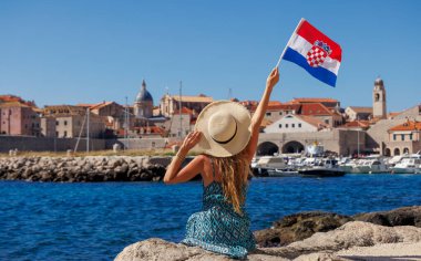 Beautiful panoramic view of beach and Dubrovnik city landscape- travel, vacation, tour tourism in Croatia clipart