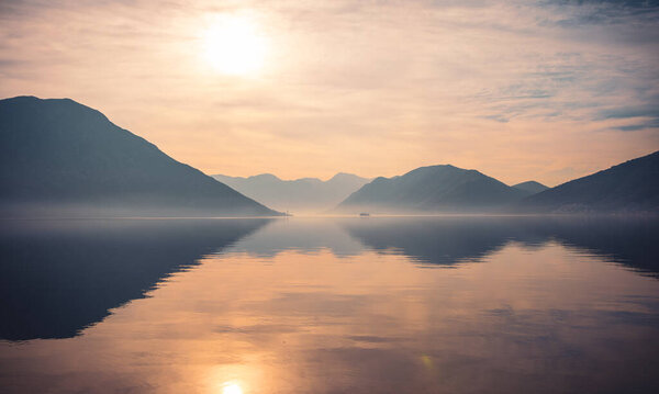 beautiful sunset on lake and mountain- Montengro, Bay of Kotor