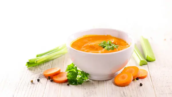 bowl of vegetable soup- carrot soup